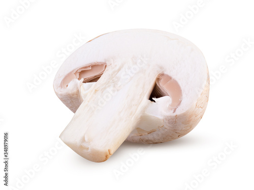 Half of fresh champignon mushroom isolated on white background close up