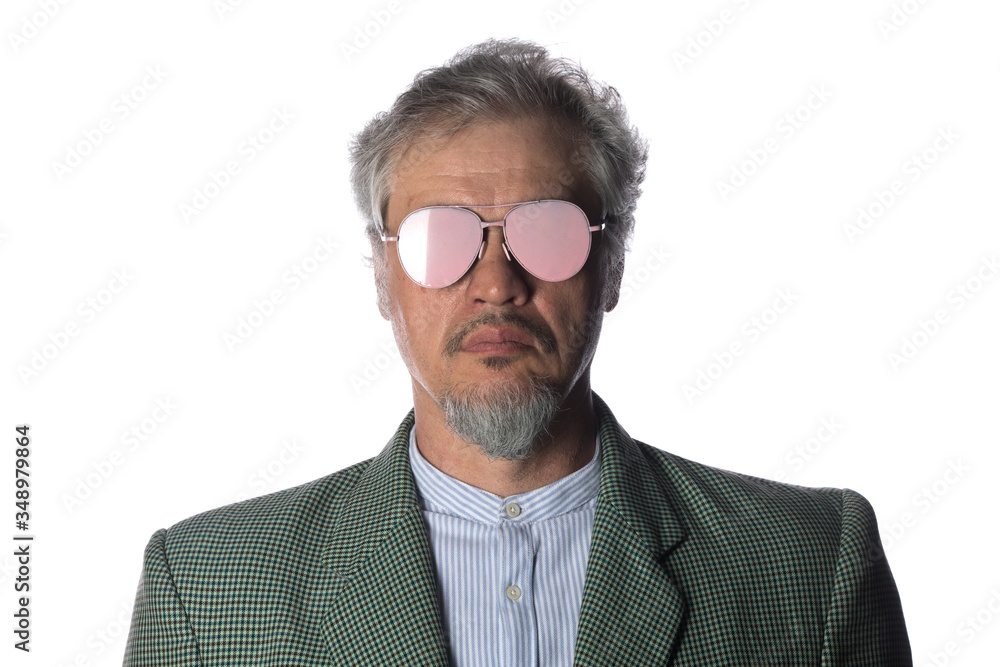 portrait of an elderly bearded man in sunglasses