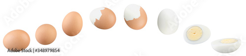 Chicken eggs flying in air on white background. Set of whole, sliced, half and unshelled eggs