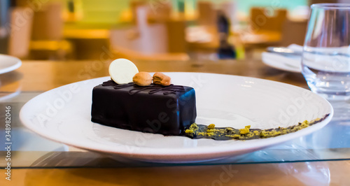 Selection of desserts: amandine, meringue with chocolate and strawberries, caramel cake