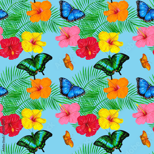 Tropical butterflies  hibiscus flowers  palm leaves on a blue background. Jungle seamless pattern design for wallpaper  paper  textile  fabric.