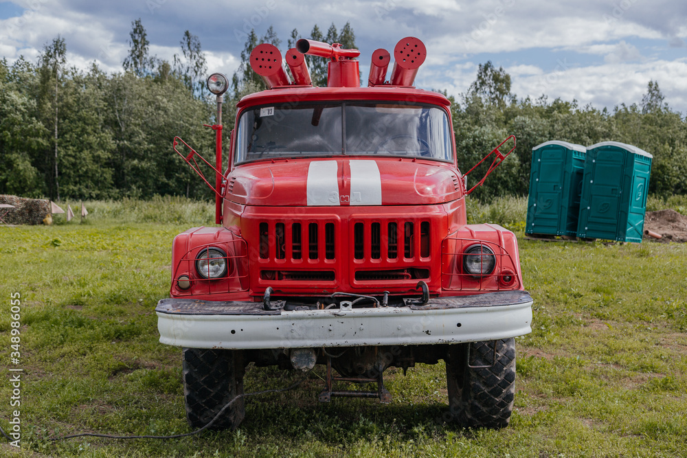 Soviet fire engine, against the background of the forest