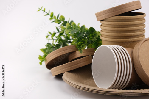 The concept of, ecology, eco, eco friendly. Natural eco-friendly disposable utensils. Dish plate, cup and fast food box containe