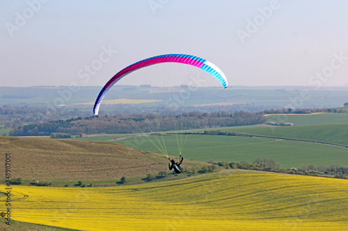 Paraglider flying wing at Milk Hill 