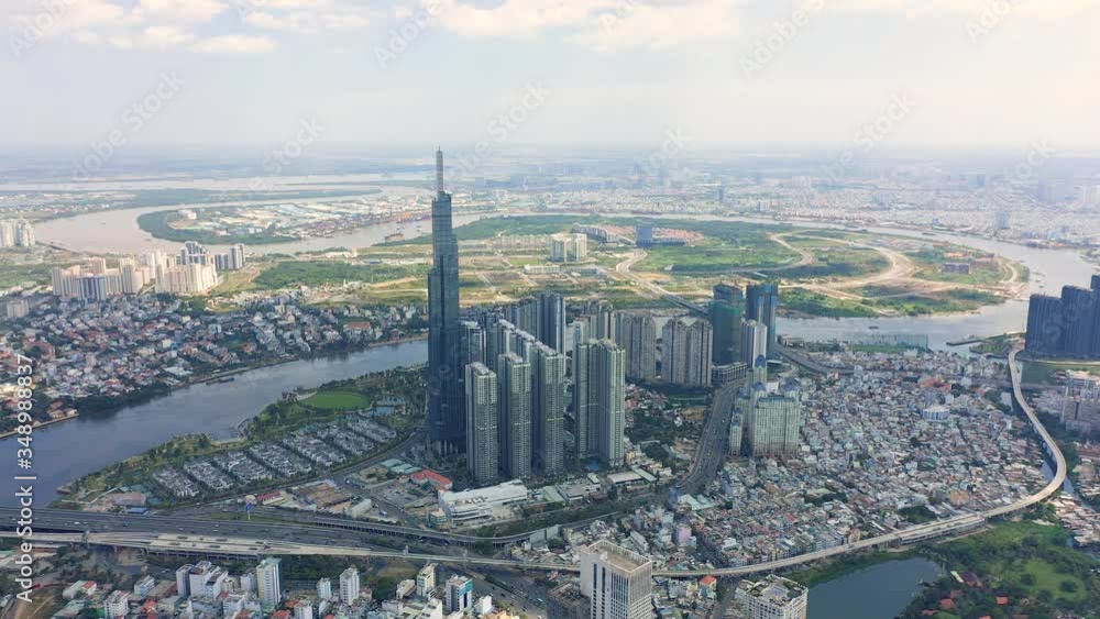 HOCHIMINH, VIETNAM - APRIL, 2020: Aerial drone view of skyscrapers and other modern buildings at downtown of Hochiminh.