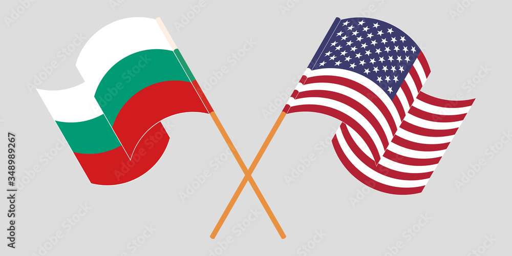 Crossed and waving flags of Bulgaria and the USA Crossed and waving flags of Bulgaria and the USA