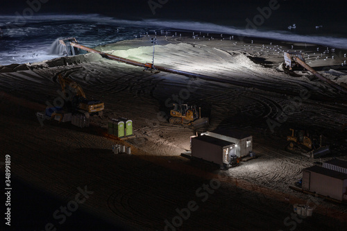 Night dredging at Virginia Beach, July 17, 2019.  photo