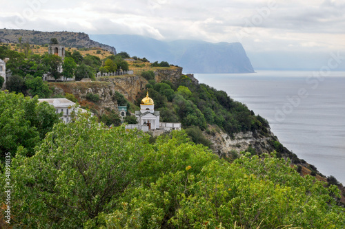 Monastery on the slope by the sea