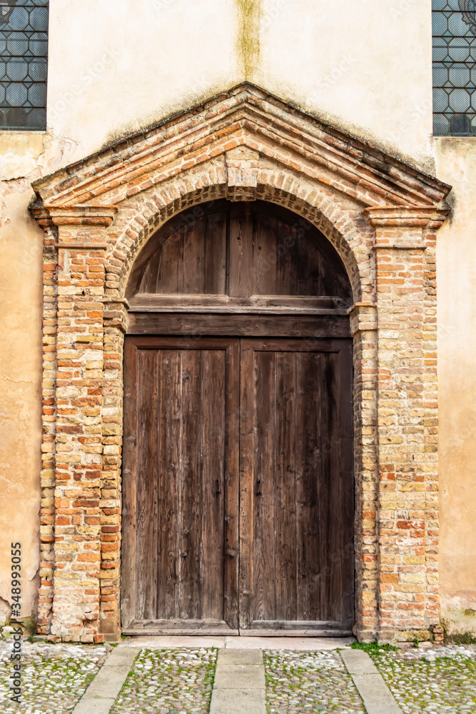View on the entrance of the church of San Martino in the village of Este in the province of Padua, Veneto - Italy