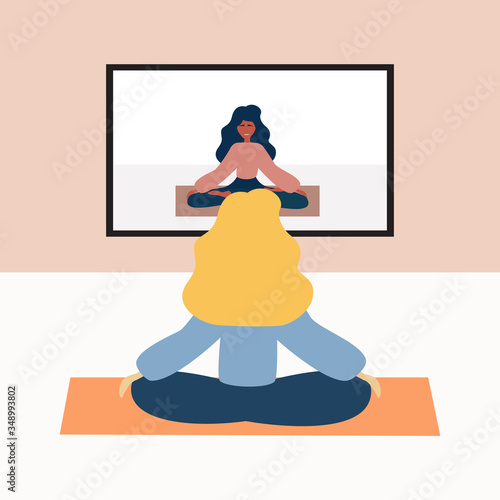 Women doing yoga at home by video conference during pandemic of coronavirus.