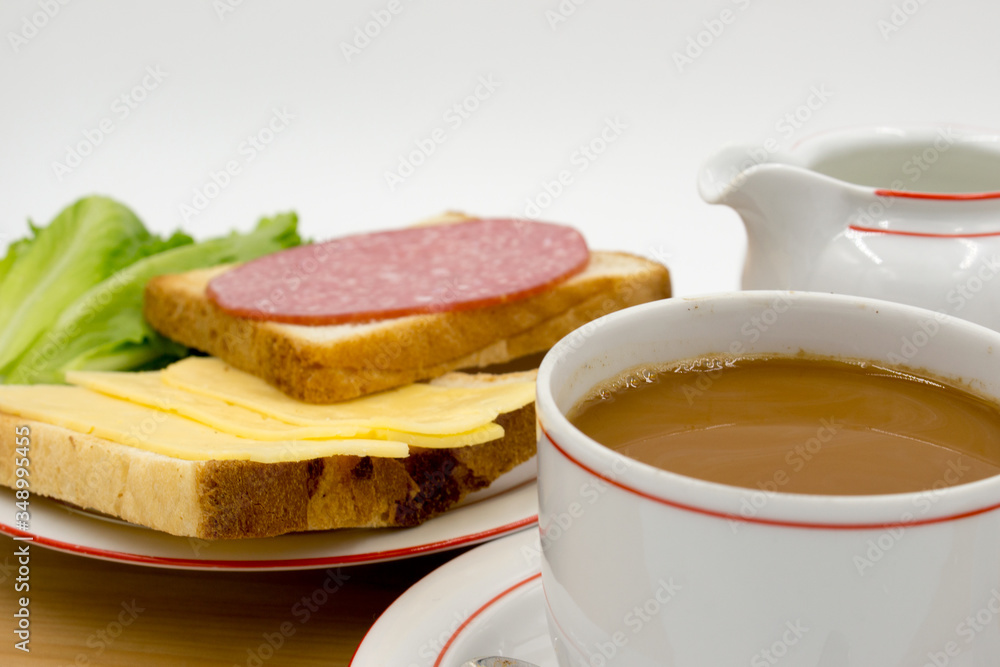 Breakfast: toast, sausage, cheese, egg, morning, salami. Breakfast: toast, sausage, cheese, egg, morning, salami.