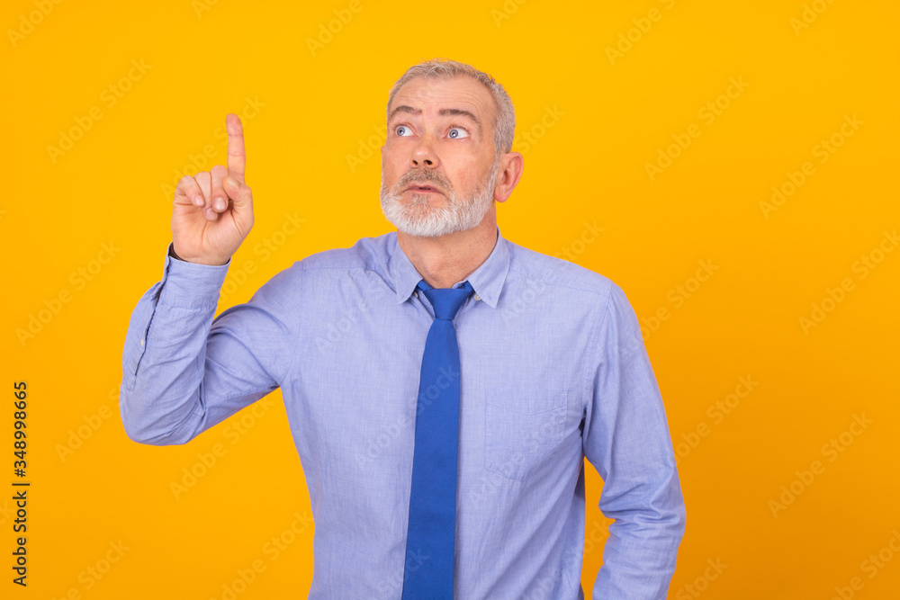 business man pointing isolated on color background business man pointing isolated on color background
