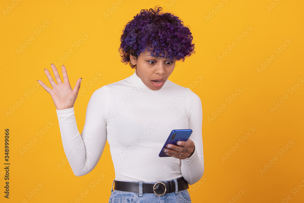 girl or woman with mobile phone isolated on color background girl or woman with mobile phone isolated on color background