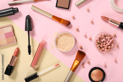 Set of decorative cosmetics on a colored background