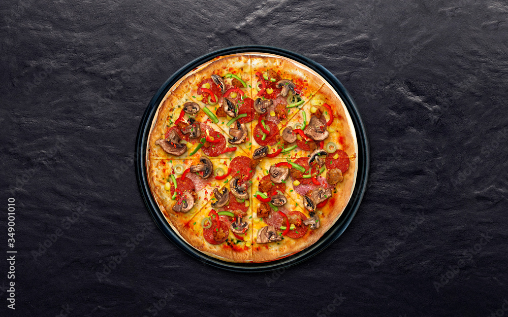 pizza in a bowl on a black background pizza in a bowl on a black background
