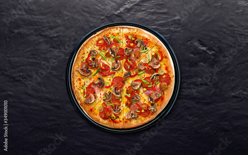 pizza in a bowl on a black background