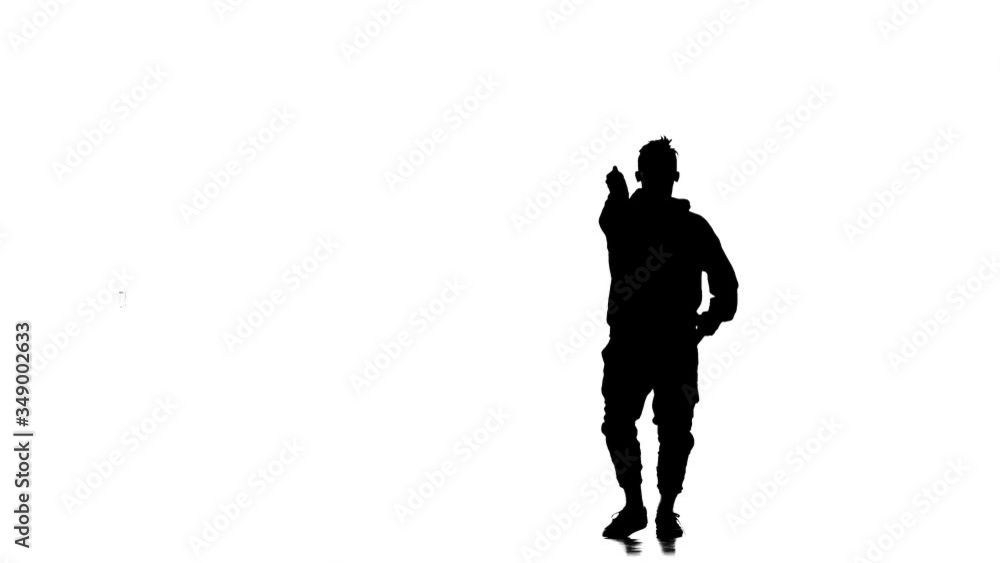 black silhouette on a white background, young energetic guy vigorously dancing hip hop, freestyle, street dance, performs complex movements, slow motion black silhouette on a white background, young energetic guy vigorously dancing hip hop, freestyle, street dance, performs complex movements, slow motion