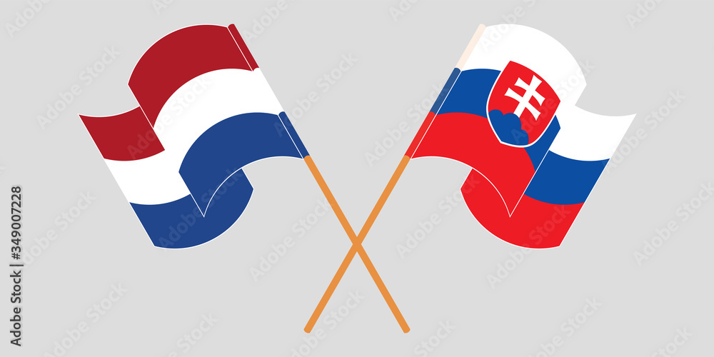 Crossed and waving flags of Slovakia and the Netherlands