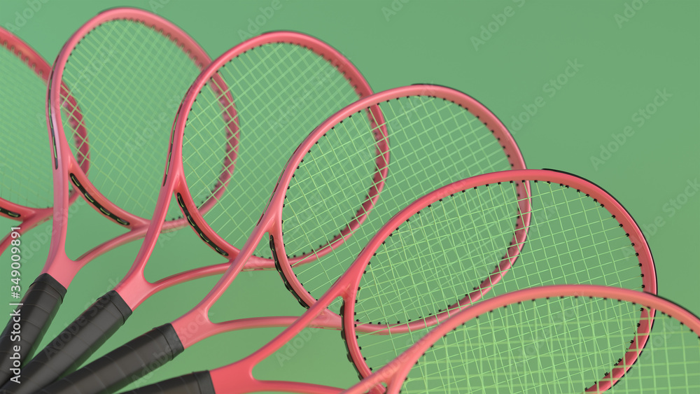 The row of pink tennis rackets on green background. 3d render with depth of field. The row of pink tennis rackets on green background. 3d render with depth of field.