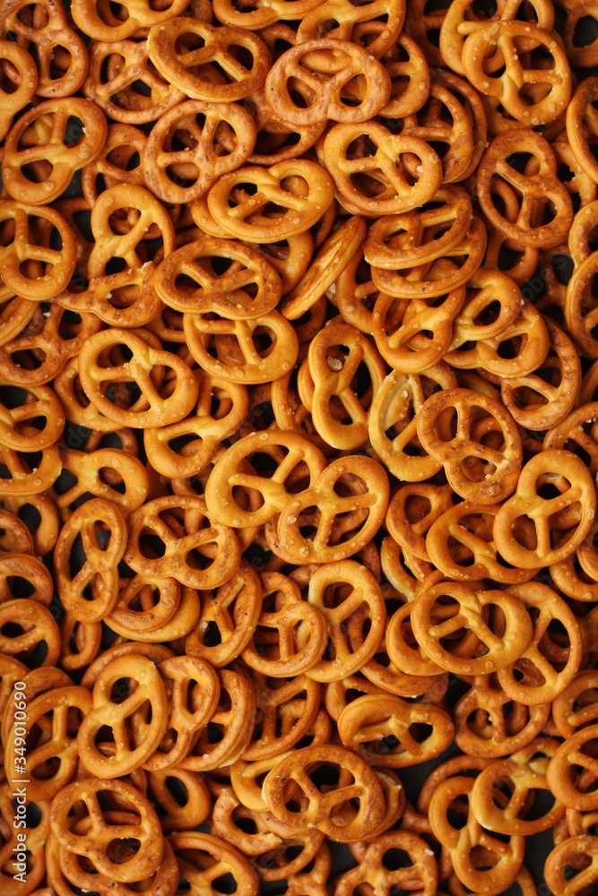 Delicious pretzels with salt on the table Delicious pretzels with salt on the table