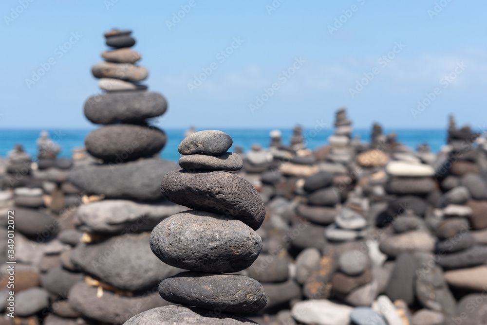 Stone cairns on Puerto de la Cruz coast, Tenerife island, Spain Stone cairns on Puerto de la Cruz coast, Tenerife island, Spain