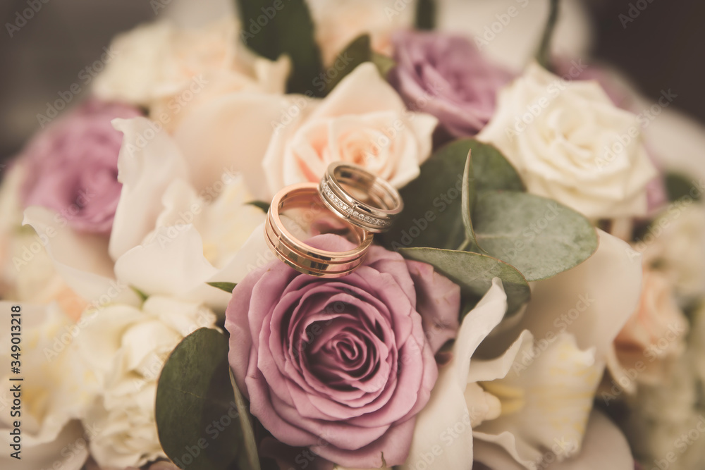 Wedding rings on the bride's bouquet Wedding rings on the bride's bouquet