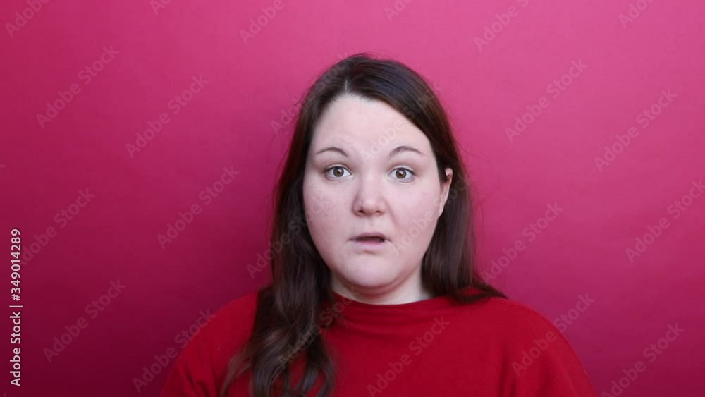 A surprised girl's face. Raised eyebrow. Quick blinking eyes. A surprised girl's face. Raised eyebrow. Quick blinking eyes.