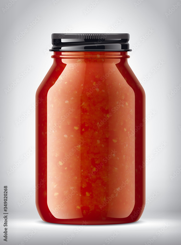 Glass Jar with tomato sauce on background. Glass Jar with tomato sauce on background.