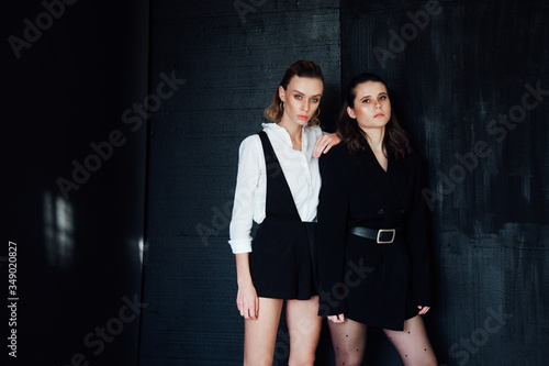 Two beautiful female girlfriends next to brunette and blonde © dmitriisimakov