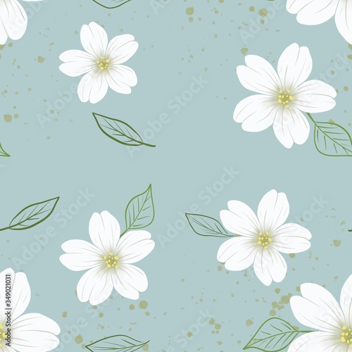 Seamless pattern with white flowers on a mint background.
