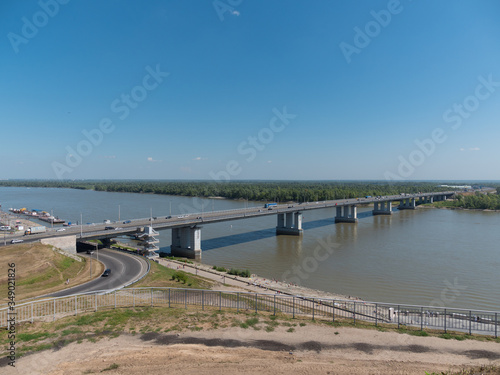 Bridge with cars at the entrance to Barnaul Russia © Arrows