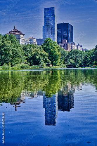 reflection in the water central park in manhattan new york city