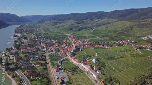 Aerial panorama of Weisenkirchen in der Wachau town and vineyards. Wachau valley, Austria photo