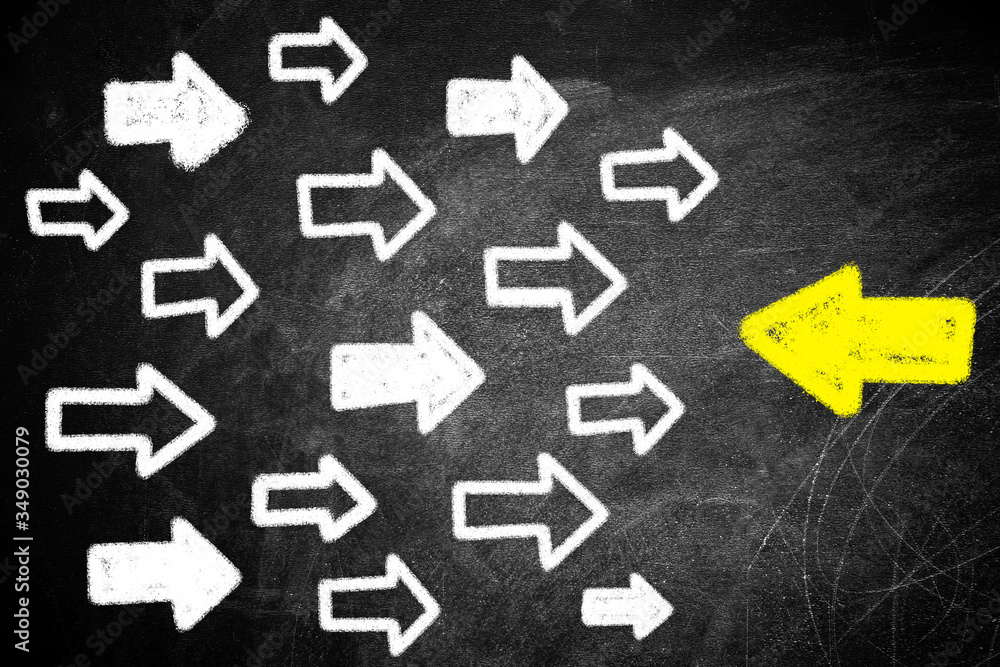 Choose your way. Yellow and white arrows aiming in different directions on black background Choose your way. Yellow and white arrows aiming in different directions on black background