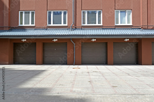 Garages on the ground floor of a modern apartment building. Zelenogradsk, Kaliningrad region photo