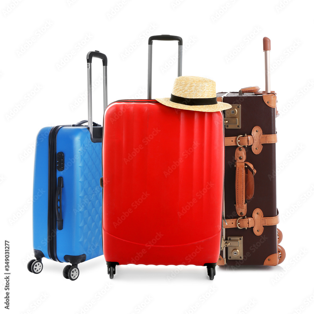 Set of different stylish suitcases for travelling on white background Set of different stylish suitcases for travelling on white background