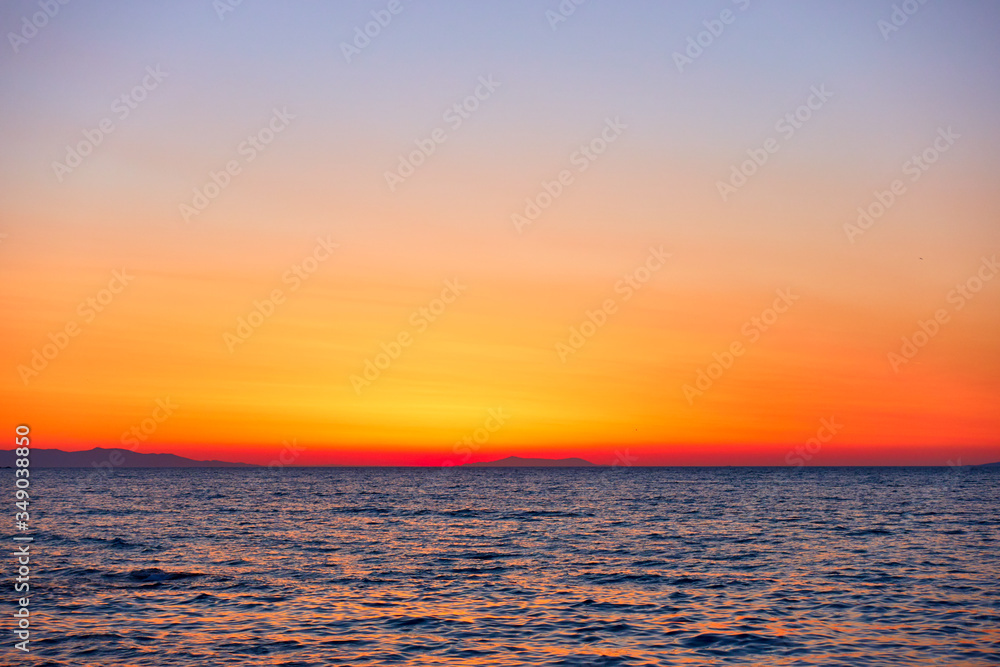 Colorful orange sky and the sea at sunset