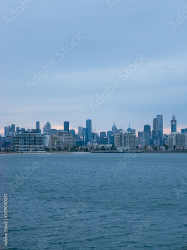 City skyline of Melbourne on beach © Pat Whelen