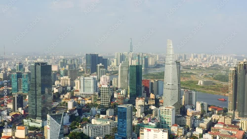 HOCHIMINH, VIETNAM - APRIL, 2020: Aerial drone view of skyscrapers and other modern buildings at downtown of Hochiminh. HOCHIMINH, VIETNAM - APRIL, 2020: Aerial drone view of skyscrapers and other modern buildings at downtown of Hochiminh.