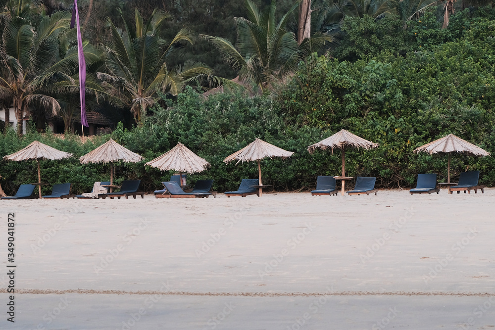 tropical beach with umbrellas