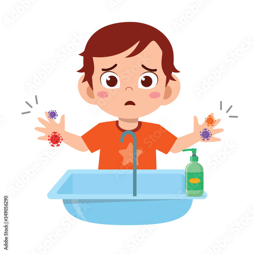 happy cute little kid boy wash hand in sink