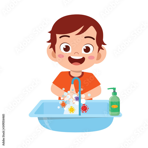 happy cute little kid boy wash hand in sink