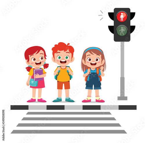 happy cute little kid boy and girl cross the road