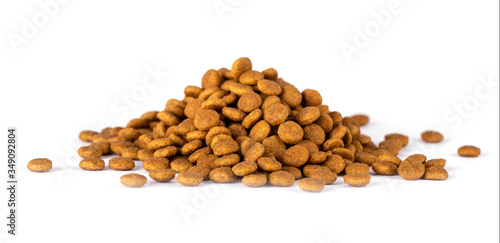 Fotografia The dry pet food. isolated on white.