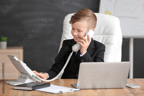 Little secretary working in...