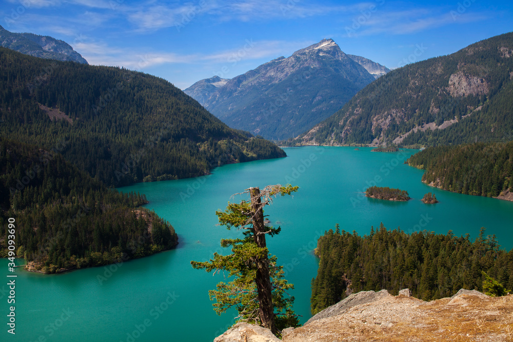 Diablo Lake, a reservoir off the North Cascades Highway in the North Cascade mountains of Washington state. The beautiful turquoise color of the lake is caused by glacial silt.