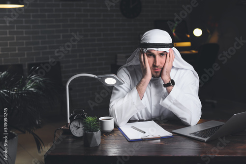 Tired Asian businessman wor...
