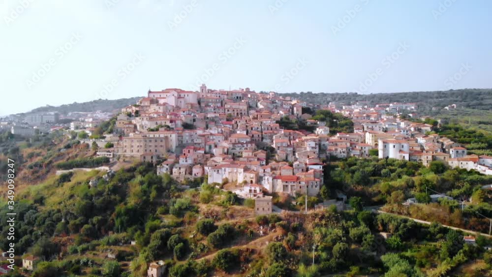 Aerial, tracking, drone shot of the Seminara village, on a sunny day, Calabria, Italy Aerial, tracking, drone shot of the Seminara village, on a sunny day, Calabria, Italy