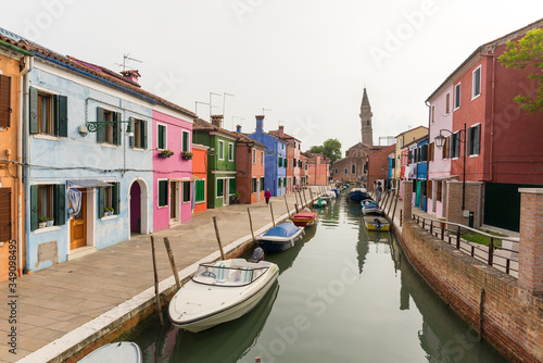 Panoramic view of Burano channel and colorful houses, in Venice, Italy. © christian vinces