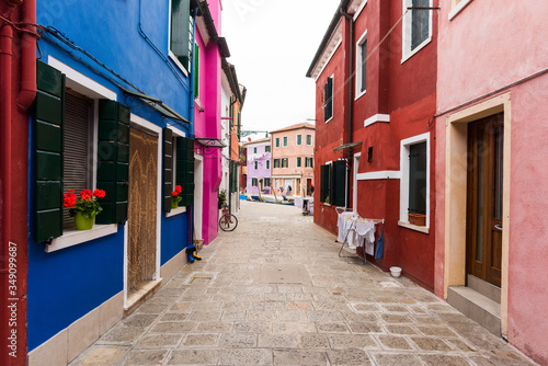 Panoramic view of houses of Burano town in Venice, Italy. © christian vinces